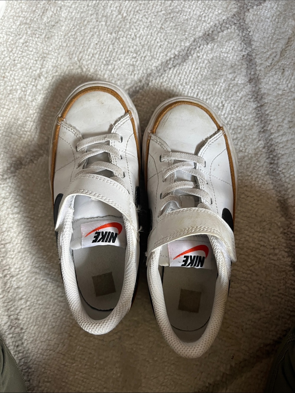 Nike Kids White Sneakers with Black Swoosh and Gum Trim